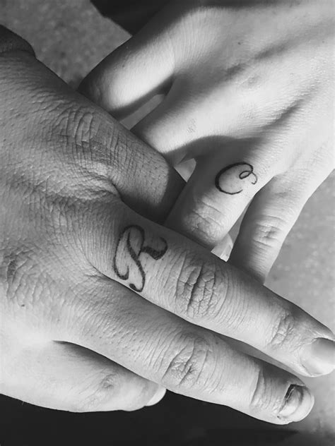 tattoo initials on ring finger